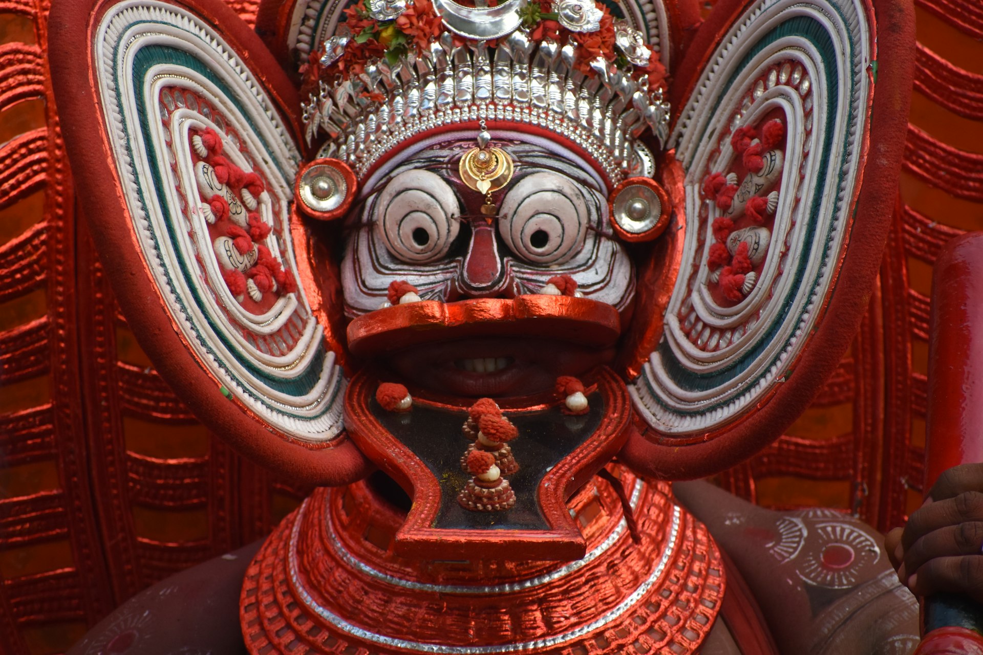 a close up of a person wearing a mask